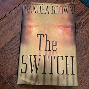 Sandra Brown 'The Switch' Gold Coffee Table Book, Hardcover. Great read, X cond